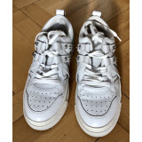 White sneakers with studs