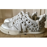 White sneakers with studs