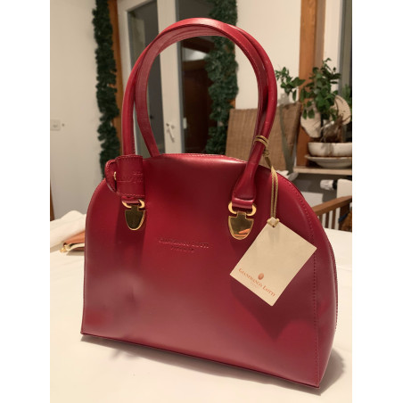 Luxury handbag in Hermes red Luxury handbag in Hermes red