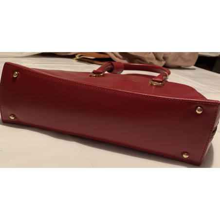 Luxury handbag in Hermes red Luxury handbag in Hermes red