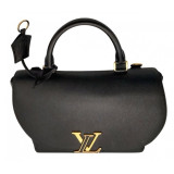 Taurillon Volta handbag with strap as good as new